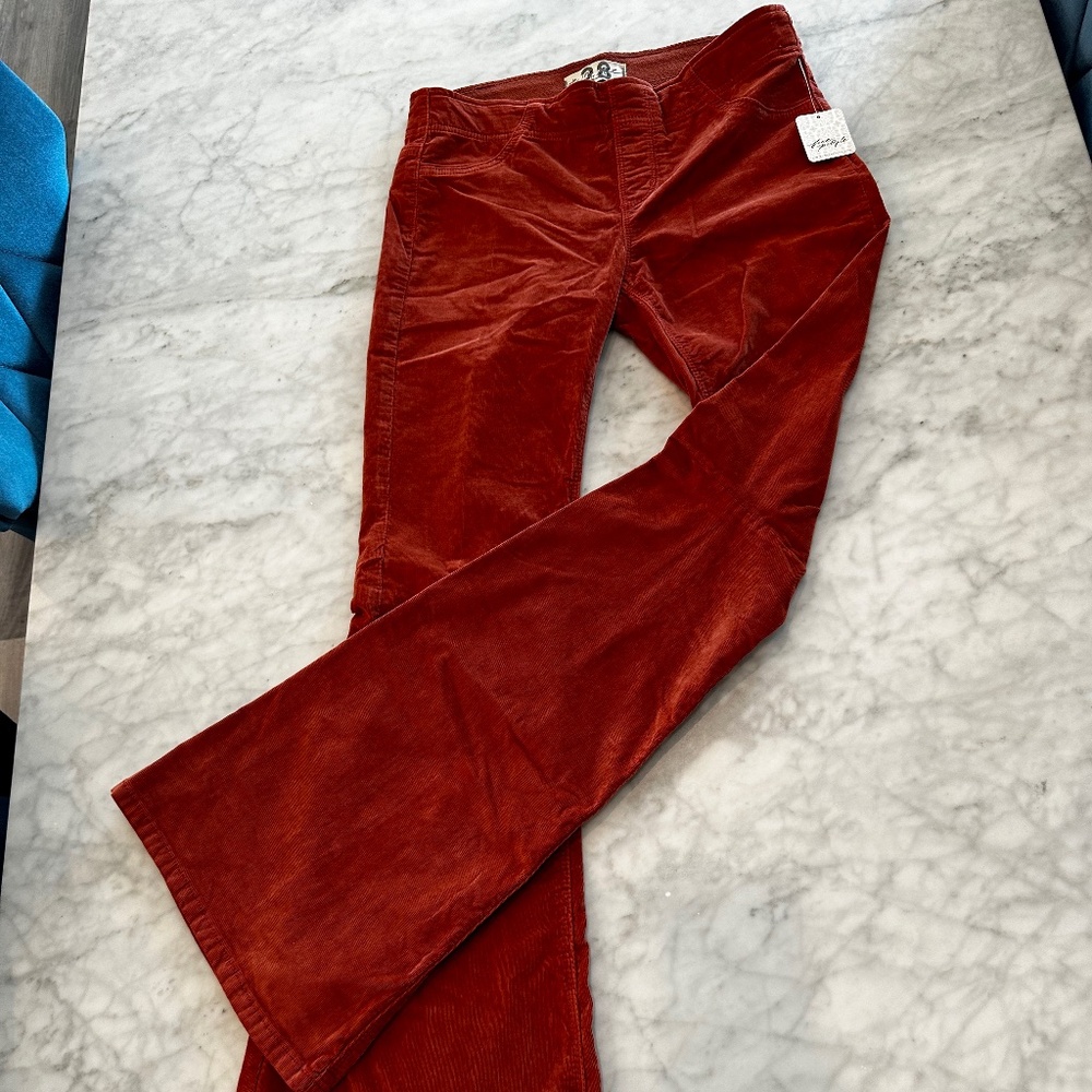 NWT Free People copper rust color low rise bell bottom flares corduroys Sz 28 :)